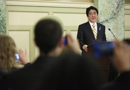 Japan's Prime Minister Shinzo Abe makes remarks at a reception with Japan-US Cultural Exchange Representatives in Washington, February 22, 2 Japan's Prime Minister Shinzo Abe makes remarks at a reception with Japan-US Cultural Exchange Representatives in Washington, February 22, 2