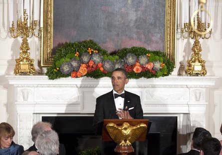 U.S. President Barack Obama makes a toast during the 2013 Governors' Dinner in the State Dining Room of the White House in Washington Februa U.S. President Barack Obama makes a toast during the 2013 Governors' Dinner in the State Dining Room of the White House in Washington Februa