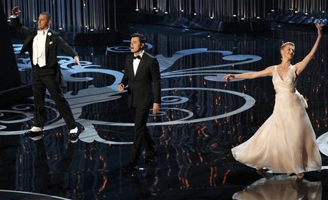Host Seth MacFarlane (C) peforms a dance with Channing Tatun (L) and Charlize Theron at the 85th Academy Awards in Hollywood, California Feb Host Seth MacFarlane (C) peforms a dance with Channing Tatun (L) and Charlize Theron at the 85th Academy Awards in Hollywood, California Feb