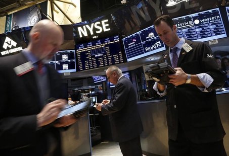 Traders work on the floor of the New York Stock Exchange February 21, 2013. REUTERS/Brendan McDermid Traders work on the floor of the New York Stock Exchange February 21, 2013. REUTERS/Brendan McDermid