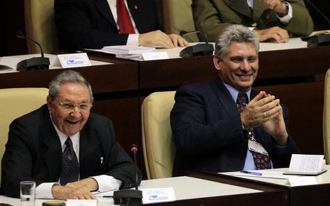 Cuba's President Raul Castro and newly elected first vice president Miguel Diaz Canel, (R), attend the closing session of the National Assem Cuba's President Raul Castro and newly elected first vice president Miguel Diaz Canel, (R), attend the closing session of the National Assem