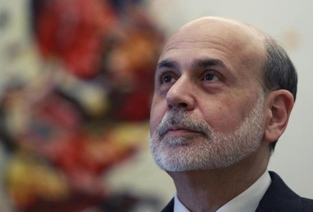 Federal Reserve Chairman Ben Bernanke waits before a meeting of the 