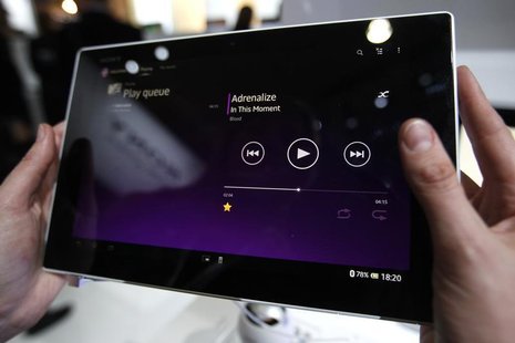 A visitor holds the new Sony Xperia Z Tablet during the Mobile World Congress in Barcelona February 25, 2013. REUTERS/Gustau Nacarino A visitor holds the new Sony Xperia Z Tablet during the Mobile World Congress in Barcelona February 25, 2013. REUTERS/Gustau Nacarino