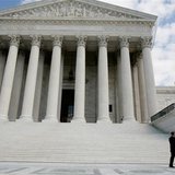 U.S. Supreme Court Justice Elena Kagan walks back into the Supreme Court building with Chief Justice of the United States John Roberts after U.S. Supreme Court Justice Elena Kagan walks back into the Supreme Court building with Chief Justice of the United States John Roberts after