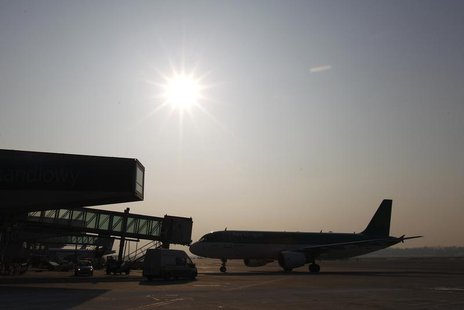 An Aer Lingus plane docks at the gate at the Chopin International Airport in Warsaw February 6, 2012. REUTERS/Peter Andrews An Aer Lingus plane docks at the gate at the Chopin International Airport in Warsaw February 6, 2012. REUTERS/Peter Andrews