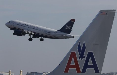 A U.S. Airways jet departs Washington's Reagan National Airport next to an American Airlines jet outside Washington, February 25, 2013. REUT A U.S. Airways jet departs Washington's Reagan National Airport next to an American Airlines jet outside Washington, February 25, 2013. REUT