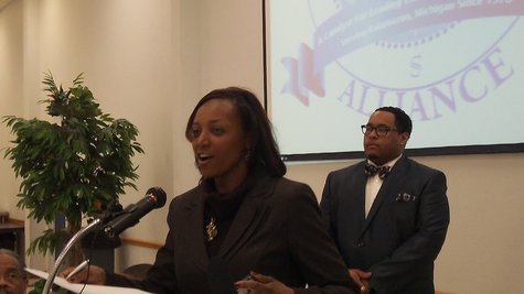 Kalamazoo City Commissioner Stephanie Moore introduces Reverend Strict Strickland. Kalamazoo City Commissioner Stephanie Moore introduces Reverend Strict Strickland.