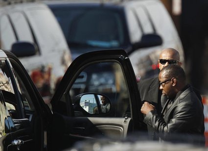 Whitney Houston's ex-husband, Bobby Brown leaves before the start of the funeral service for the pop singer at the New Hope Baptist Church i Whitney Houston's ex-husband, Bobby Brown leaves before the start of the funeral service for the pop singer at the New Hope Baptist Church i