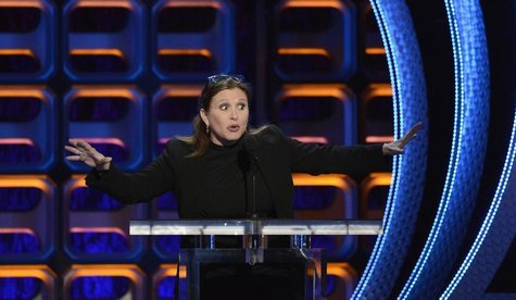 Carrie Fisher speaks during the taping of the Comedy Central Roast of Roseanne in Los Angeles August 4, 2012. REUTERS/Phil McCarten Carrie Fisher speaks during the taping of the Comedy Central Roast of Roseanne in Los Angeles August 4, 2012. REUTERS/Phil McCarten