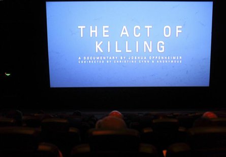 The opening of "The Act of Killing", a documentary made by Texan-born director Joshua Oppenheimer, is pictured during an underground screeni The opening of "The Act of Killing", a documentary made by Texan-born director Joshua Oppenheimer, is pictured during an underground screeni