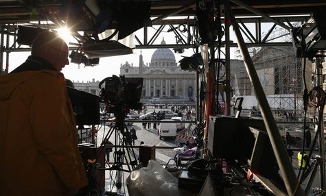 A technician works on structure set up for TV media in front of St. Peter's Square in Rome February 26, 2013. REUTERS/Alessandro Bianchi A technician works on structure set up for TV media in front of St. Peter's Square in Rome February 26, 2013. REUTERS/Alessandro Bianchi