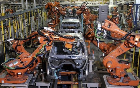 Auto assembly line robots weld on the frame of 2009 Dodge Ram pick-up trucks at the Warren Truck Assembly Plant in Warren, Michigan Septembe Auto assembly line robots weld on the frame of 2009 Dodge Ram pick-up trucks at the Warren Truck Assembly Plant in Warren, Michigan Septembe