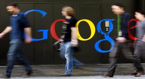 People walk past a logo next to the main entrance of the Google building in Zurich March 9, 2011. REUTERS/Arnd Wiegmann People walk past a logo next to the main entrance of the Google building in Zurich March 9, 2011. REUTERS/Arnd Wiegmann