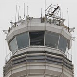 The main air traffic control tower at Reagan Washington National Airport is seen on March 24, 2011. REUTERS/Hyungwon Kang