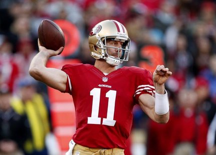 San Francisco 49ers quarterback Alex Smith throws the ball during the fourth quarter of their NFL football game against the Arizona Cardinal San Francisco 49ers quarterback Alex Smith throws the ball during the fourth quarter of their NFL football game against the Arizona Cardinal