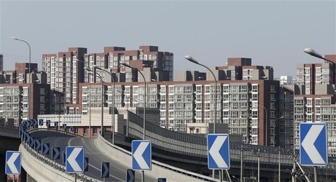 Apartments are seen from a street in Beijing February 27, 2013. REUTERS/Kim Kyung-Hoon Apartments are seen from a street in Beijing February 27, 2013. REUTERS/Kim Kyung-Hoon