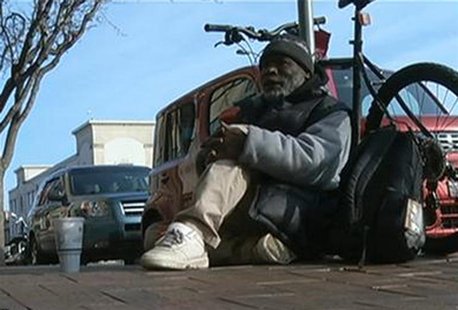 Homeless man Billy Ray Harris collects change in this undated image taken from video courtesy of KCTV5, in Kansas City Missouri. REUTERS/KCT Homeless man Billy Ray Harris collects change in this undated image taken from video courtesy of KCTV5, in Kansas City Missouri. REUTERS/KCT