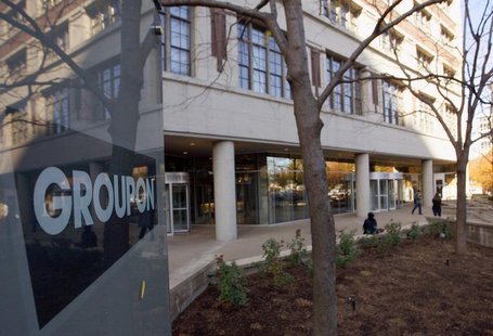 People enter and leave Groupon Inc corporate office and headquarters in Chicago, Illinois, November 4, 2011. REUTERS/Frank Polich People enter and leave Groupon Inc corporate office and headquarters in Chicago, Illinois, November 4, 2011. REUTERS/Frank Polich