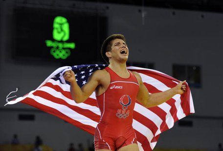 Henry Cejudo of the U.S. celebrates after defeating Tomohiro Matsunaga of Japan in their 55kg men's freestyle wrestling final match at the B Henry Cejudo of the U.S. celebrates after defeating Tomohiro Matsunaga of Japan in their 55kg men's freestyle wrestling final match at the B