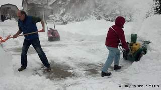 Residents in Manitowoc clear snow from their driveway, Wednesday, February 27, 2013. (courtesy of FOX 11). Residents in Manitowoc clear snow from their driveway, Wednesday, February 27, 2013. (courtesy of FOX 11).