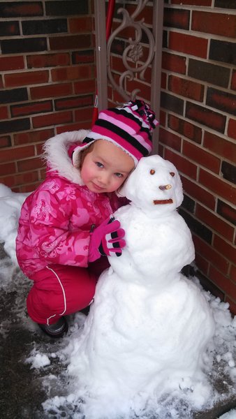 Her first snow man of the year. 