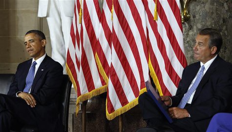U.S. President Barack Obama and House Speaker John Boehner (R) attend the unveiling ceremony for the Rosa Parks statue in the U.S. Capitol i U.S. President Barack Obama and House Speaker John Boehner (R) attend the unveiling ceremony for the Rosa Parks statue in the U.S. Capitol i