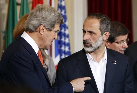 U.S. Secretary of State John Kerry (L) talks with New Syrian National Coalition head Mouaz al-Khatib during a meeting at Villa Madama in Rom U.S. Secretary of State John Kerry (L) talks with New Syrian National Coalition head Mouaz al-Khatib during a meeting at Villa Madama in Rom