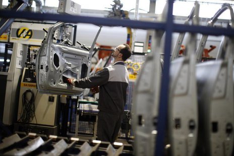 An employee works on Opel car doors at the Opel factory in Eisenach January 10, 2013. REUTERS/Lisi Niesner An employee works on Opel car doors at the Opel factory in Eisenach January 10, 2013. REUTERS/Lisi Niesner