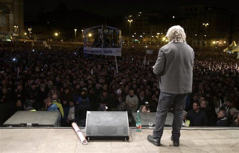 Five Star Movement leader and comedian Beppe Grillo (R) speaks during a rally in Rome February 22, 2013. REUTERS/Max Rossi (ITALY - Tags: PO Five Star Movement leader and comedian Beppe Grillo (R) speaks during a rally in Rome February 22, 2013. REUTERS/Max Rossi (ITALY - Tags: PO