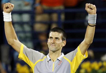 Novak Djokovic of Serbia celebrates after his men's singles quarter-final match against Andreas Seppi of Italy during the ATP Dubai Tennis C Novak Djokovic of Serbia celebrates after his men's singles quarter-final match against Andreas Seppi of Italy during the ATP Dubai Tennis C