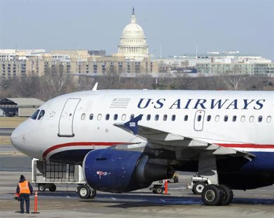 A US Airways plane arrives at the Ronald Reagan Washington National Airport in Arlington County, Virginia February 10, 2013 REUTERS/Mike The A US Airways plane arrives at the Ronald Reagan Washington National Airport in Arlington County, Virginia February 10, 2013 REUTERS/Mike The