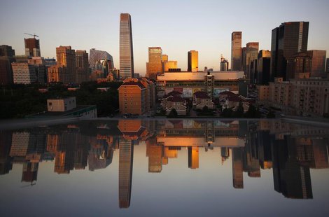 Residential and commercial buildings are seen reflected in a window during a sunset in Central Business District (CBD) of Beijing September Residential and commercial buildings are seen reflected in a window during a sunset in Central Business District (CBD) of Beijing September