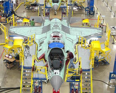 Workers can be seen on the moving line and forward fuselage assembly areas for the F-35 Joint Strike Fighter at Lockheed Martin Corp's facto Workers can be seen on the moving line and forward fuselage assembly areas for the F-35 Joint Strike Fighter at Lockheed Martin Corp's facto