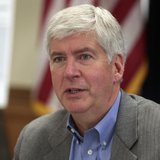Michigan Governor Rick Snyder talks about the future of the city of Detroit during a news conference in Detroit, Michigan February 21, 2013.
