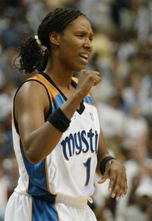 Washington Mystics' Chamique Holdsclaw celebrates her team taking the lead from the New York Liberty during the second half of the WNBA East Washington Mystics' Chamique Holdsclaw celebrates her team taking the lead from the New York Liberty during the second half of the WNBA East