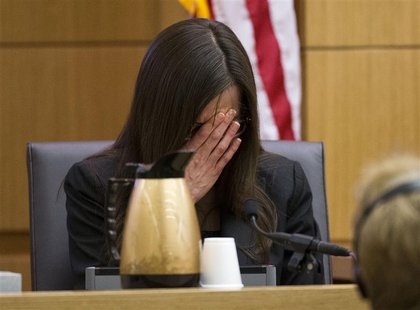 Jodi Arias breaks down after being asked by prosecutor Juan Martinez if she was crying when she stabbed Travis Alexander and when she slit h Jodi Arias breaks down after being asked by prosecutor Juan Martinez if she was crying when she stabbed Travis Alexander and when she slit h
