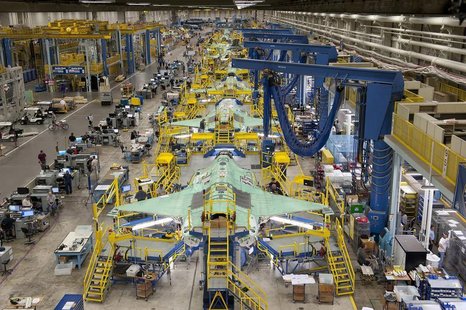 Workers can be seen on the moving line and forward fuselage assembly areas for the F-35 Joint Strike Fighter at Lockheed Martin Corp's facto Workers can be seen on the moving line and forward fuselage assembly areas for the F-35 Joint Strike Fighter at Lockheed Martin Corp's facto