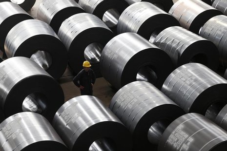 An employee works at a steel factory that exports to Europe and America in Jiaxing, Zhejiang province, February 28, 2013. REUTERS/William Ho An employee works at a steel factory that exports to Europe and America in Jiaxing, Zhejiang province, February 28, 2013. REUTERS/William Ho