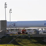The SpaceX Falcon 9 rocket with the Dragon capsule rests near its launching pad as it is prepared for launch at the Cape Canveral Air Force The SpaceX Falcon 9 rocket with the Dragon capsule rests near its launching pad as it is prepared for launch at the Cape Canveral Air Force