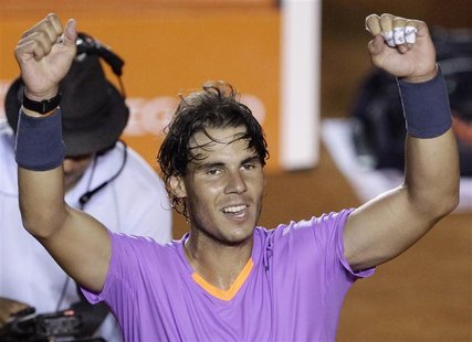 Rafael Nadal of Spain celebrates his victory against Leonardo Mayer of Argentina during their men's singles match at the Acapulco Internatio Rafael Nadal of Spain celebrates his victory against Leonardo Mayer of Argentina during their men's singles match at the Acapulco Internatio