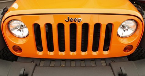 The grill of a Jeep is pictured at a Chrysler/Jeep dealership in Vienna, Virginia April 26, 2012. REUTERS/Kevin Lamarque The grill of a Jeep is pictured at a Chrysler/Jeep dealership in Vienna, Virginia April 26, 2012. REUTERS/Kevin Lamarque