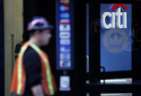 A man walks past a Citibank branch in lower Manhattan, New York October 16, 2012. REUTERS/Carlo Allegri A man walks past a Citibank branch in lower Manhattan, New York October 16, 2012. REUTERS/Carlo Allegri