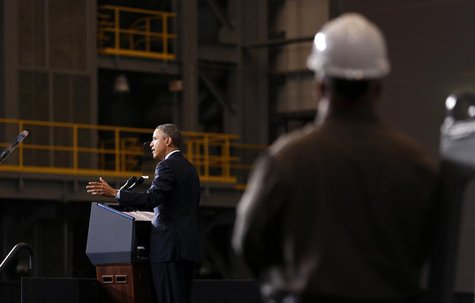 A shipyard worker listens as U.S. President Barack Obama speaks at Newport News Shipbuilding in Newport News, Virginia February 26, 2013. RE A shipyard worker listens as U.S. President Barack Obama speaks at Newport News Shipbuilding in Newport News, Virginia February 26, 2013. RE