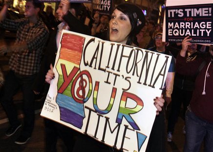 People carry placards in a march celebrating Tuesday's ruling on Proposition 8 in West Hollywood, California, February 7, 2012. REUTERS/Jona People carry placards in a march celebrating Tuesday's ruling on Proposition 8 in West Hollywood, California, February 7, 2012. REUTERS/Jona