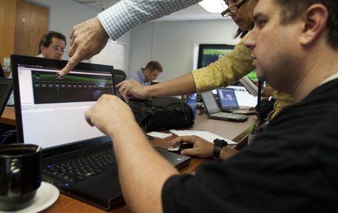 Attacking team members work to hack into a network during a drill at a Department of Homeland Security cyber security defense lab at the Ida Attacking team members work to hack into a network during a drill at a Department of Homeland Security cyber security defense lab at the Ida