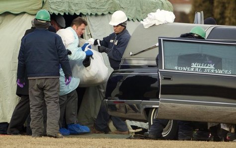 The body of Urooj Khan is carried to a hearse for forensic autopsy by the Cook County Medical Examiners office in Chicago, January 18, 2013. The body of Urooj Khan is carried to a hearse for forensic autopsy by the Cook County Medical Examiners office in Chicago, January 18, 2013.