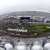Crowds gather on the track before the start of the NASCAR Sprint Cup Series Daytona 500 race at the Daytona International Speedway in Dayton Crowds gather on the track before the start of the NASCAR Sprint Cup Series Daytona 500 race at the Daytona International Speedway in Dayton