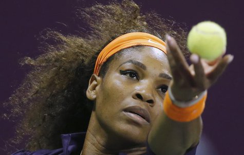 Serena Williams of the U.S. serves the ball to Victoria Azarenka of Belarus during the final match at the Qatar Open tennis tournament in Do Serena Williams of the U.S. serves the ball to Victoria Azarenka of Belarus during the final match at the Qatar Open tennis tournament in Do