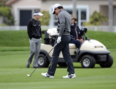 Rory McIlroy of Northern Ireland reacts after hitting the ball into the water near the 18th hole during second round play in the Honda Class Rory McIlroy of Northern Ireland reacts after hitting the ball into the water near the 18th hole during second round play in the Honda Class