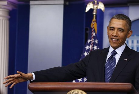 U.S. President Barack Obama answers questions from the media after a meeting with Congressional leaders in the Oval Office at the White Hous U.S. President Barack Obama answers questions from the media after a meeting with Congressional leaders in the Oval Office at the White Hous